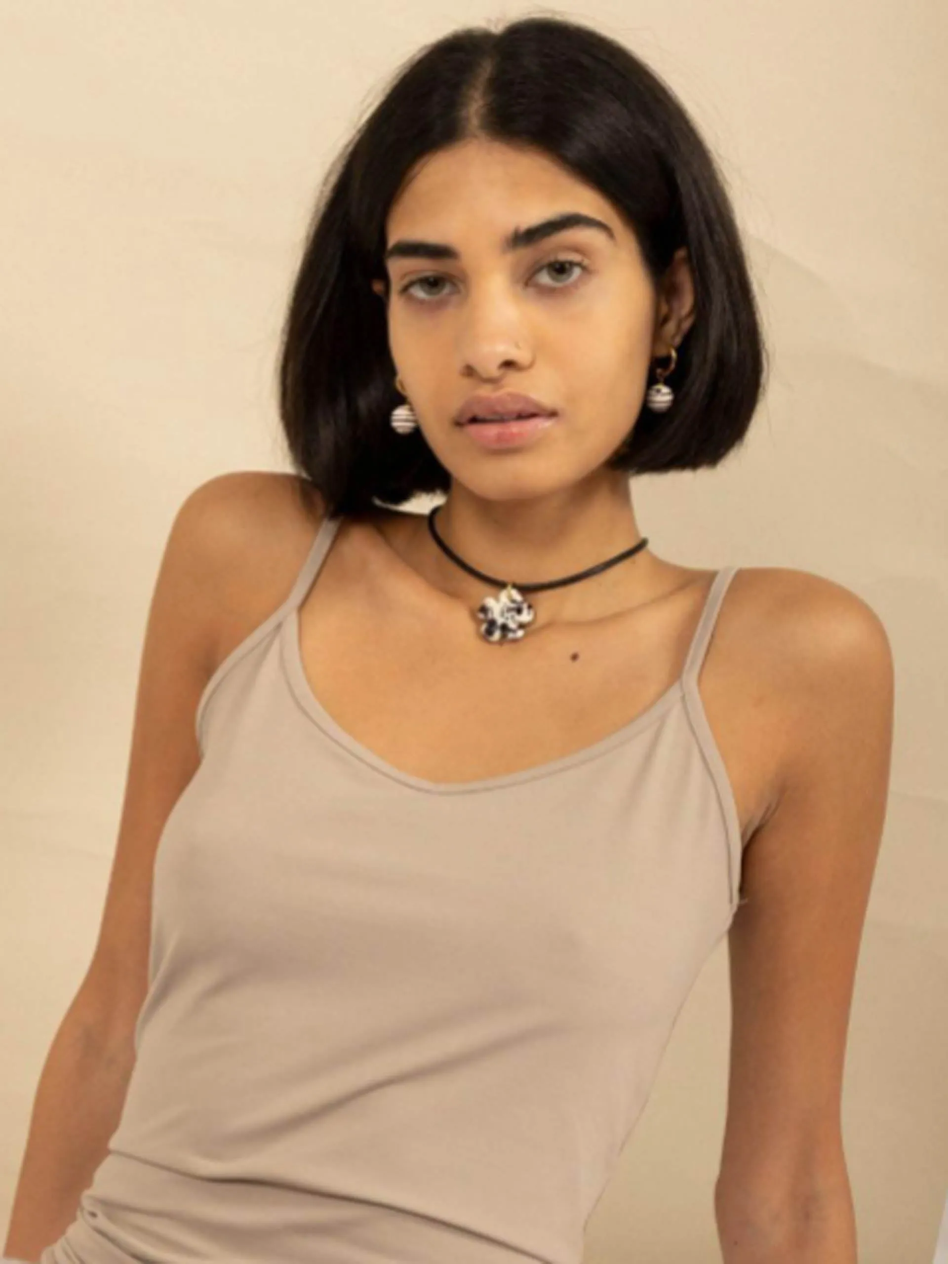 Black and white clover leather cord necklace