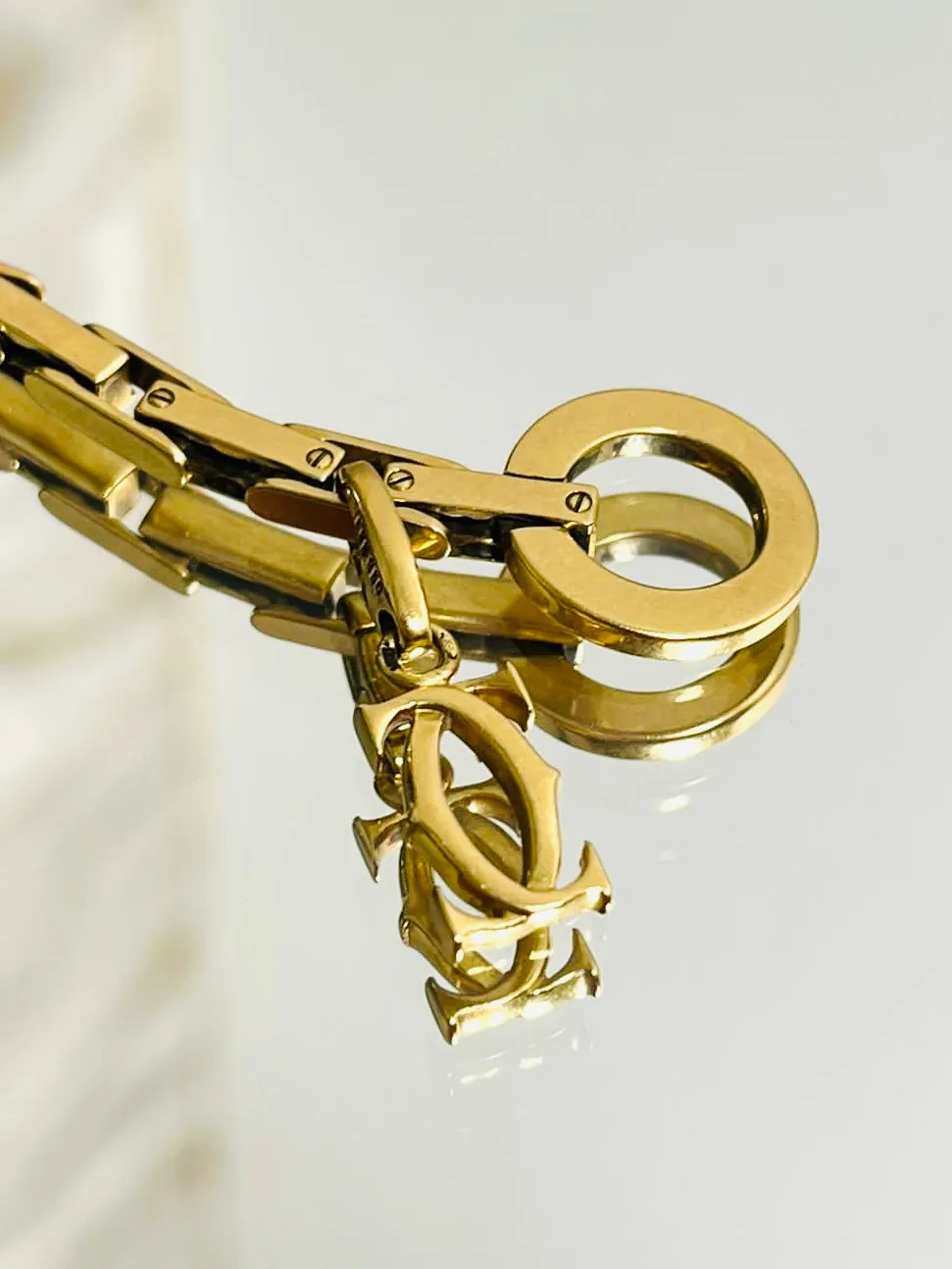Cartier 18k Gold Agrafe Bracelet & Logo Charm