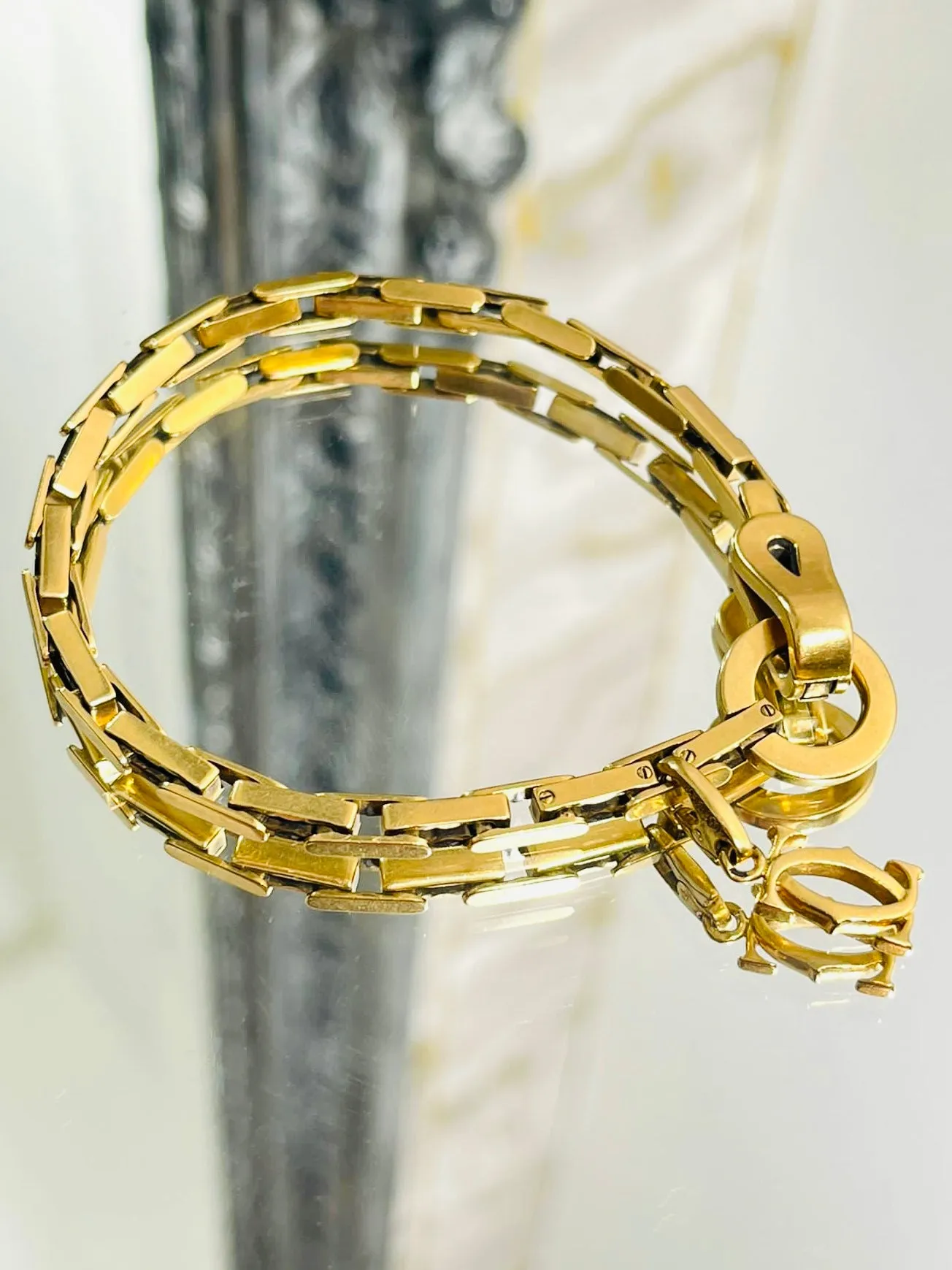 Cartier 18k Gold Agrafe Bracelet & Logo Charm