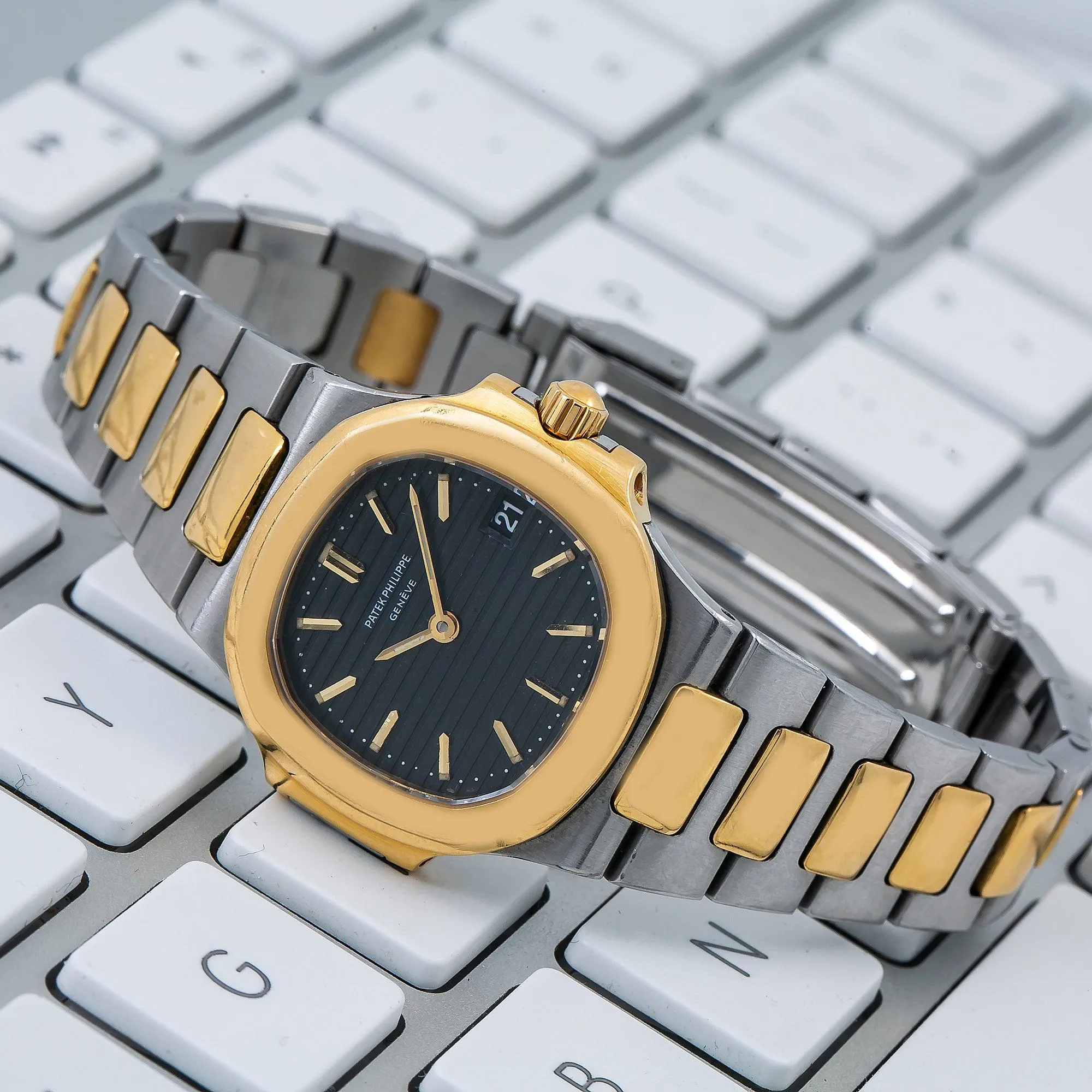 Patek Philippe Nautilus 30MM Black Dial With Two Tone Bracelet